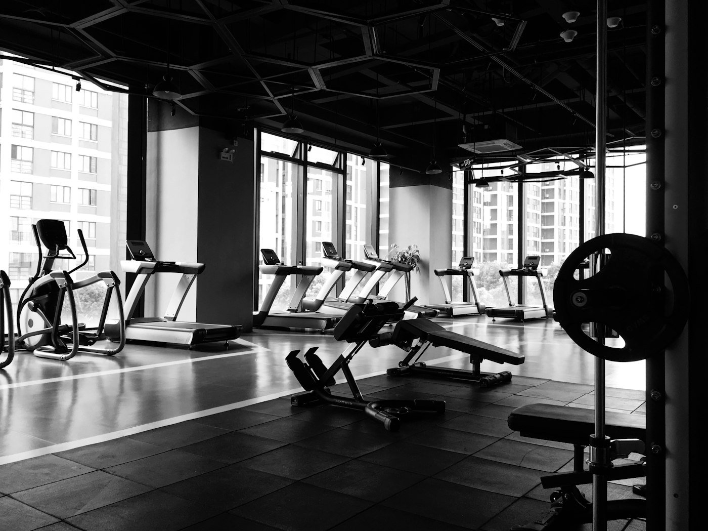Gym floor with racks and machines