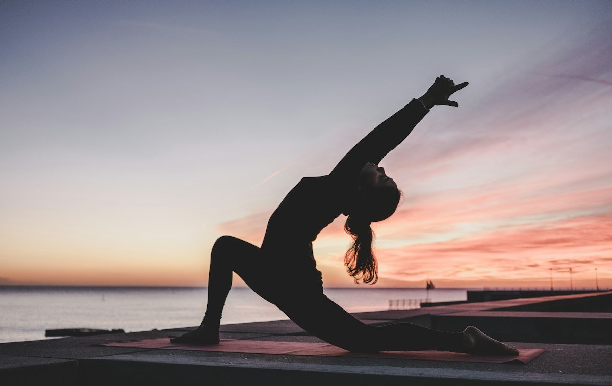 Person holding a yoga pose